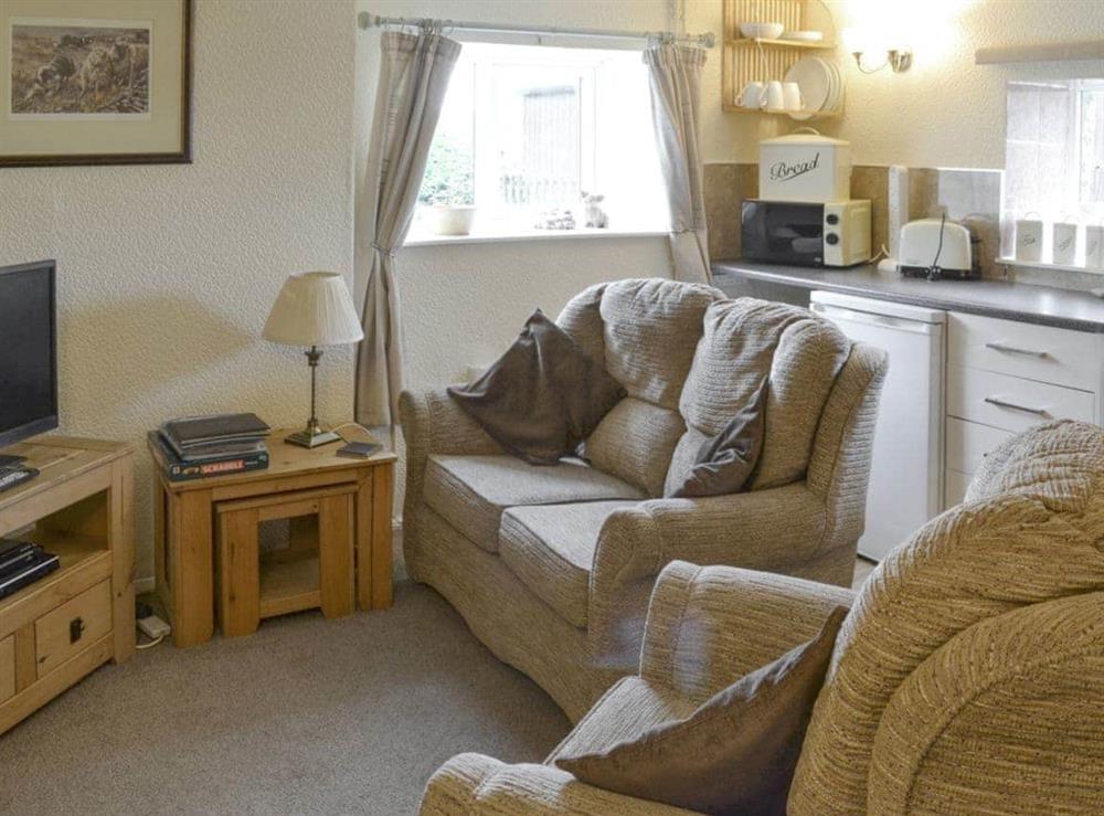 Cosy living area at Cart Cottage, 