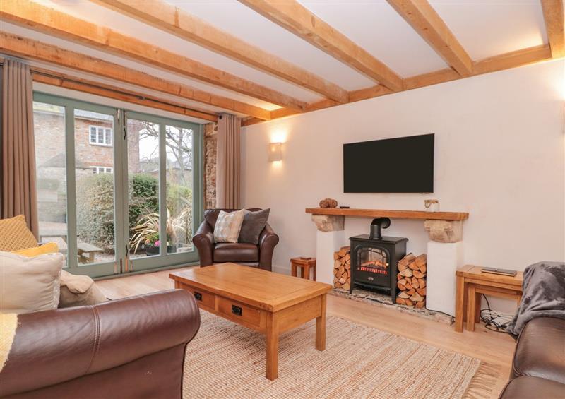 Relax in the living area at 1 Alston Farm Cottages, Churston Ferrers near Brixham