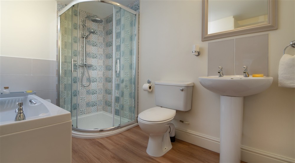 The bathroom at 1 Cart Lodge Barn in Upper Sheringham, Norfolk