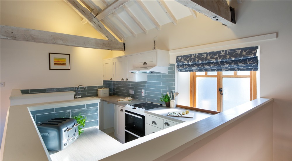 The kitchen at 1 Cart Lodge Barn in Upper Sheringham, Norfolk
