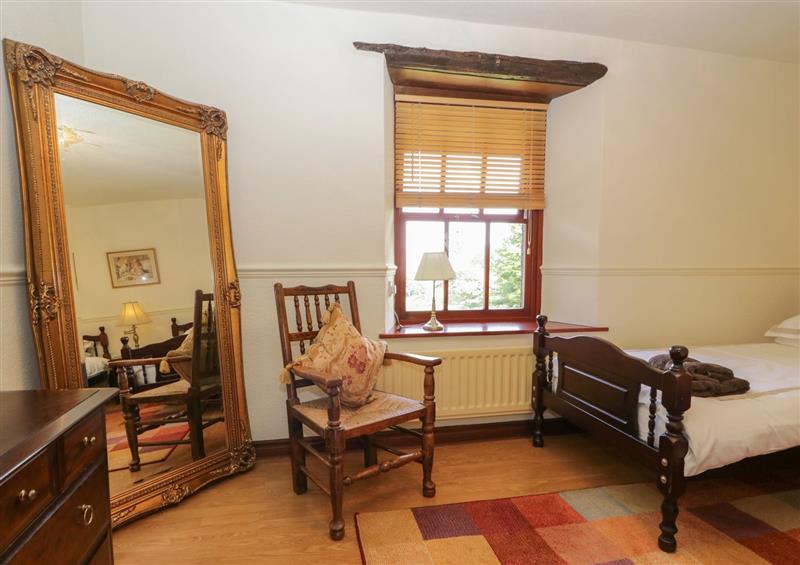 A bedroom in 1 Cherry Tree Cottage at 1 Cherry Tree Cottage, The Green near Millom