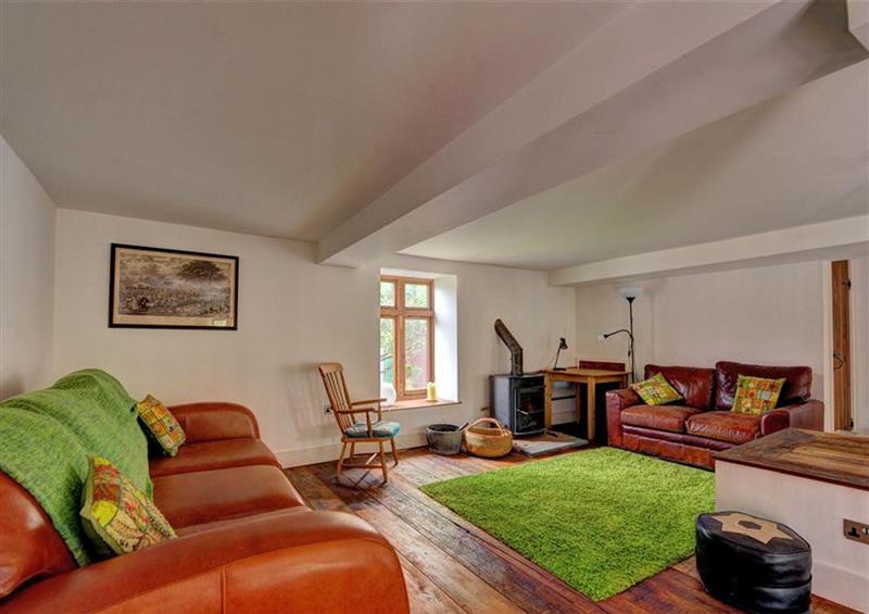 Enjoy the living room at 1 Church Cliff Apartments, Lyme Regis