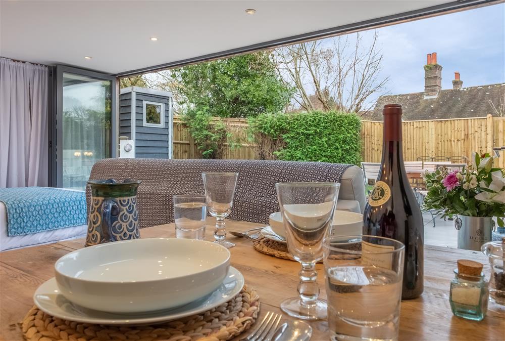Enjoy dining with the doors wide open at 1 Church Cottages and Garden Room, Westmeston