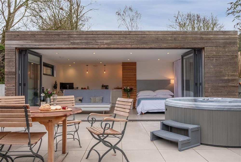 The Garden Room is a stunning detached studio for two guests, situated in the quiet East Sussex village of Westmeston