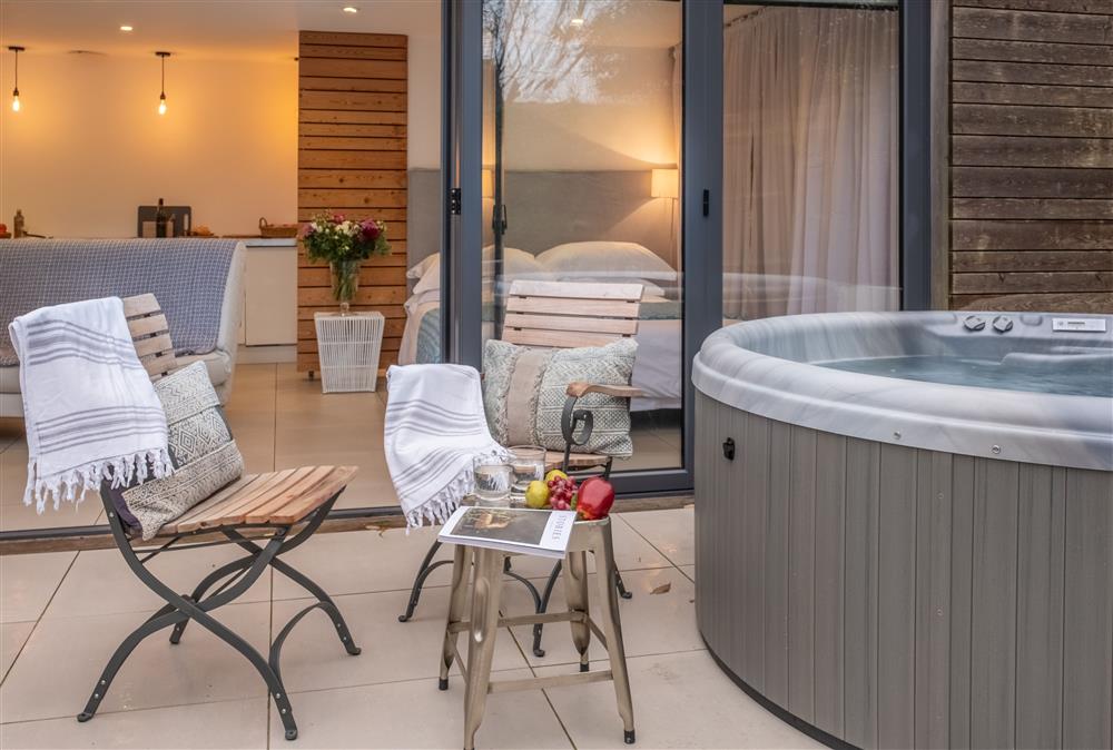The Garden Room with its hot tub on the terrace, is the perfect escape for rest and relaxation (photo 2) at 1 Church Cottages and Garden Room, Westmeston