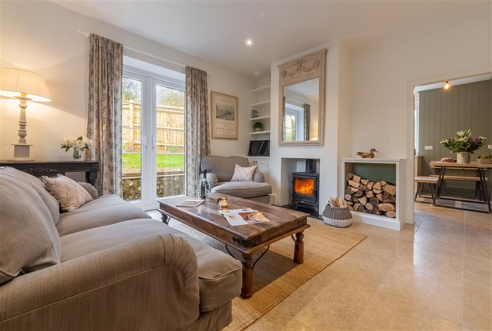 Open-plan sitting room and dining area at 1 Church Cottages, Westmeston