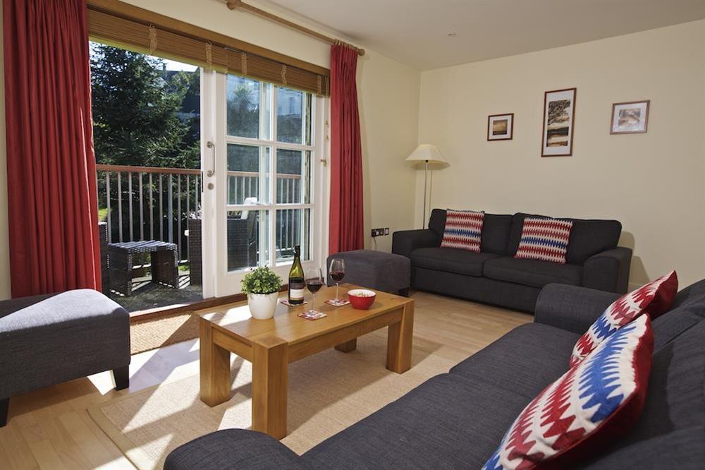 Lounge on first floor with doors to balcony at 1 Combehaven in , Salcombe