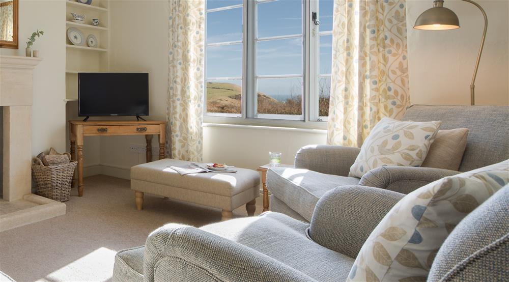 The sitting room at 1 Currendon Cottages in Swanage, Dorset