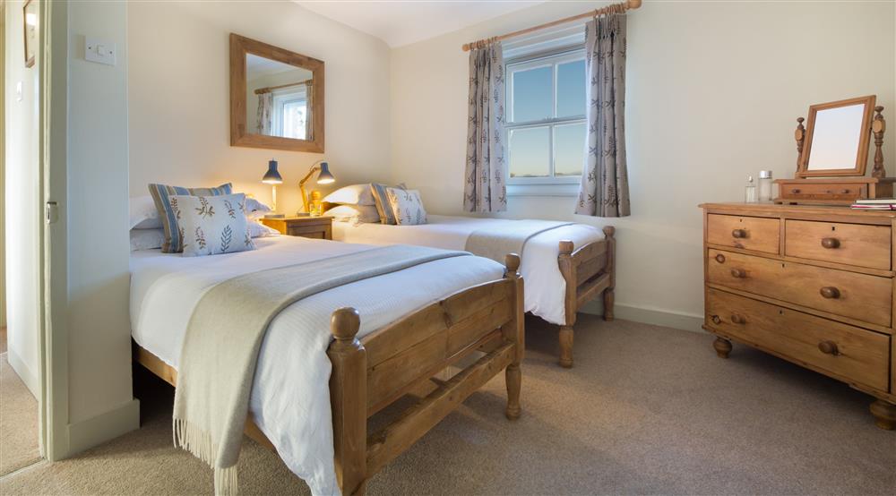 The twin bedroom at 1 Currendon Cottages in Swanage, Dorset