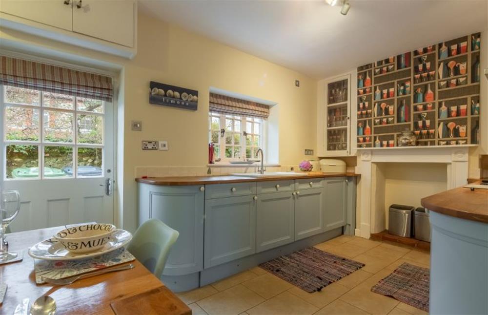 Ground floor: A fitted kitchen with oak worktops at 1 Dix Cottages, Thornham near Hunstanton