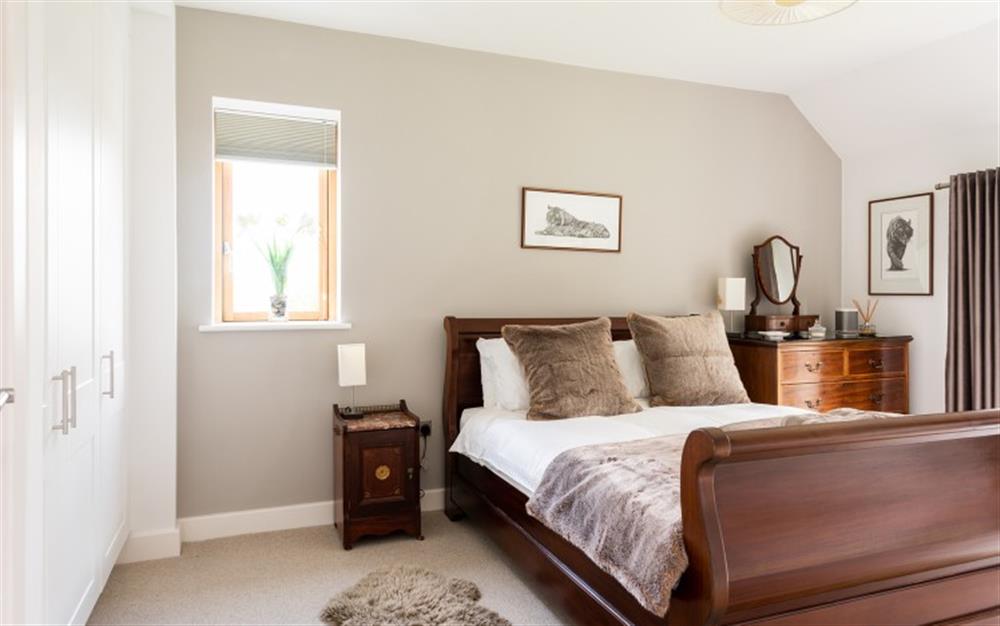 Master bedroom with king size bed. at 1 Dufour in East Allington