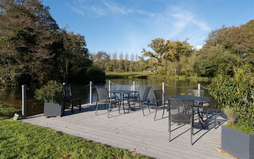 Peaceful communal seating by the lake. at 1 Dufour in East Allington