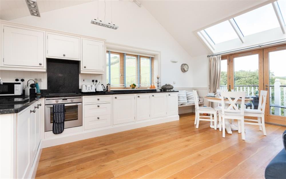 Fabulous views from the light and airy living and kitchen space at 1 Edith Mews in Hallsands
