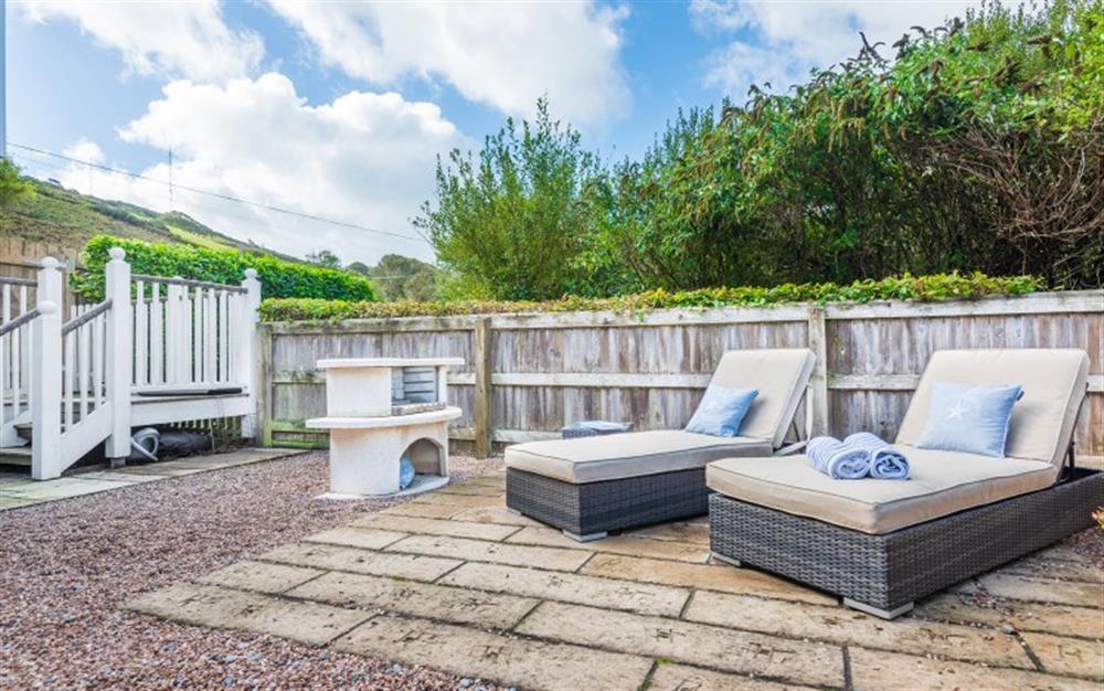 Lounge around in the rear courtyard at 1 Edith Mews in Hallsands