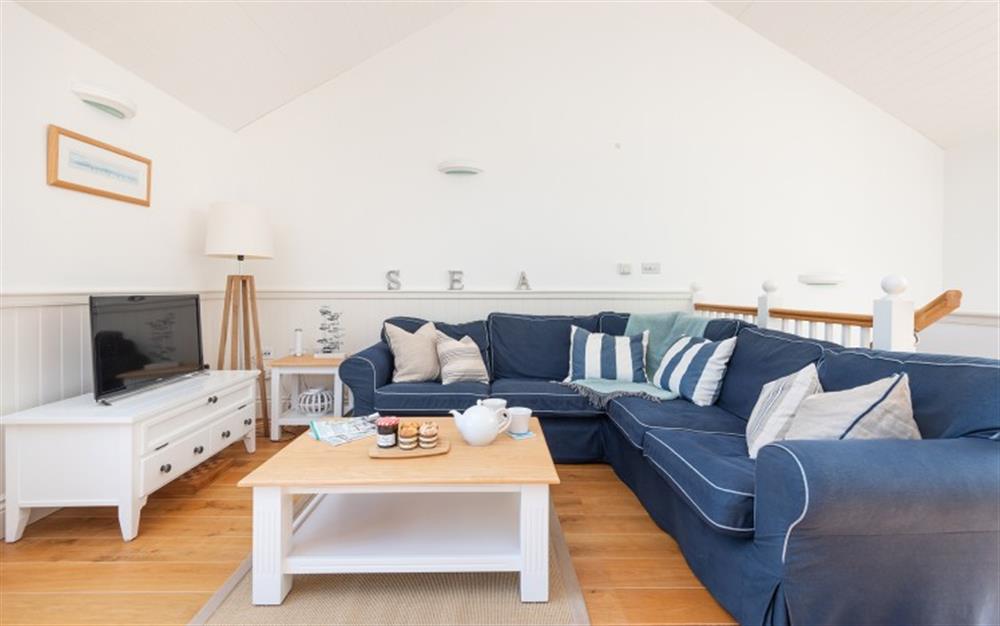 The comfortable lounge space. at 1 Edith Mews in Hallsands