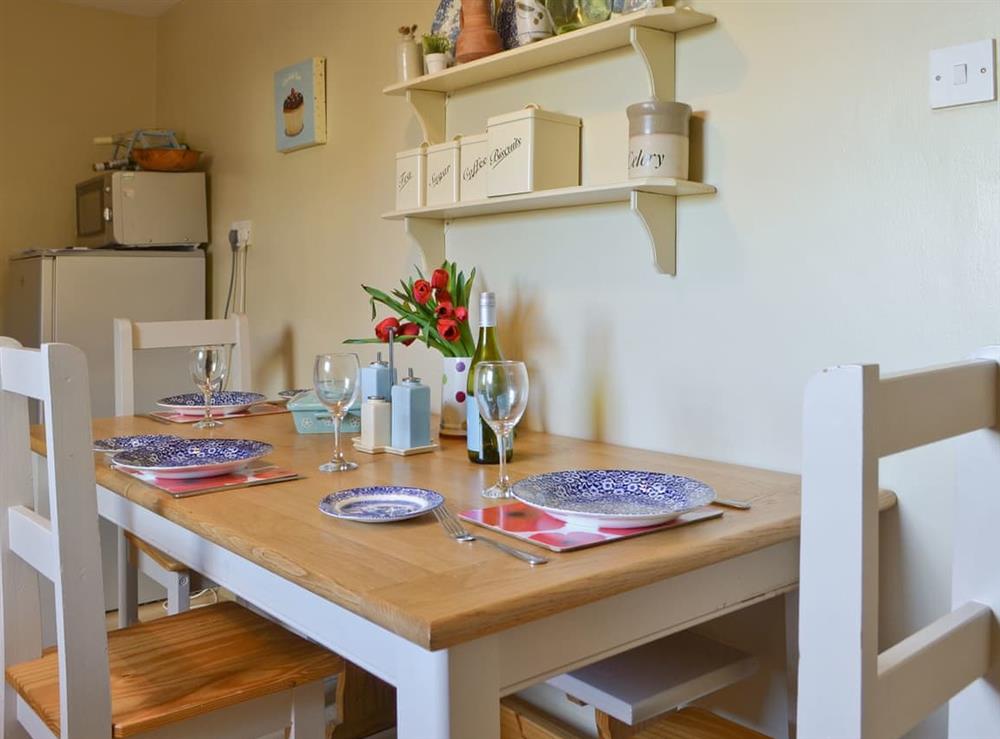 Charming dining area in kitchen at 1 Gill Edge Cottages in Bainbridge, near Hawes, North Yorkshire