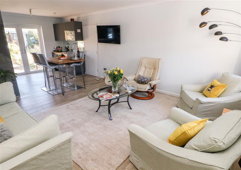 Relax in the living area at 1 Gloucester Way, Pembroke Dock