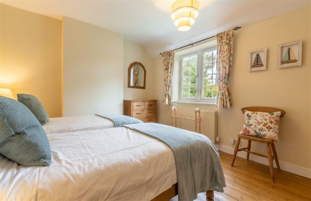 First floor: Bedroom three with twin beds at 1 Hall Lane Cottages, Thornham  near Hunstanton