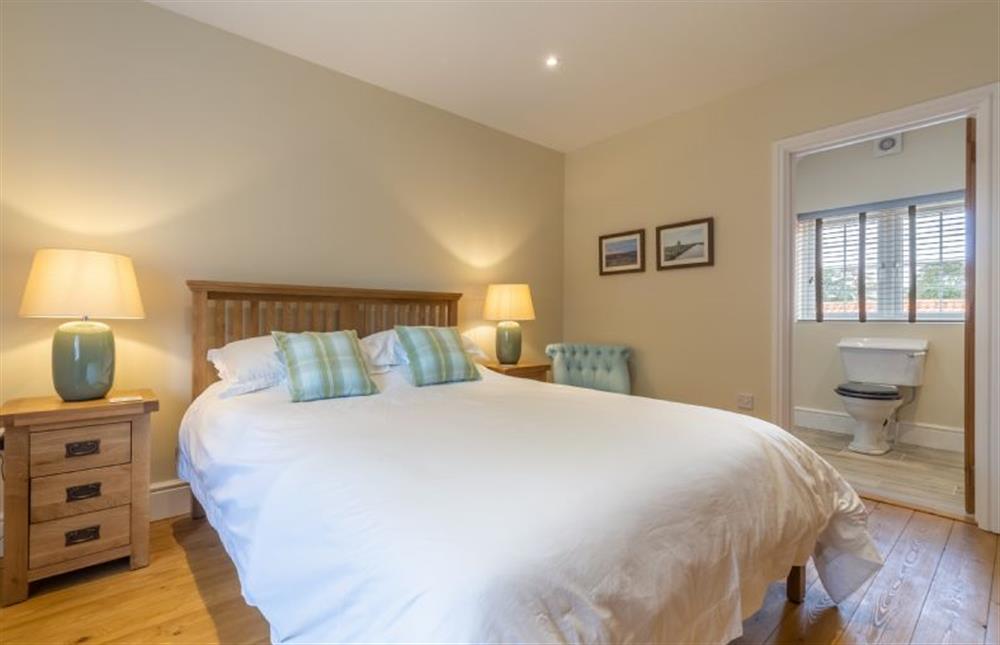 First floor: Master bedroom  at 1 Hall Lane Cottages, Thornham  near Hunstanton