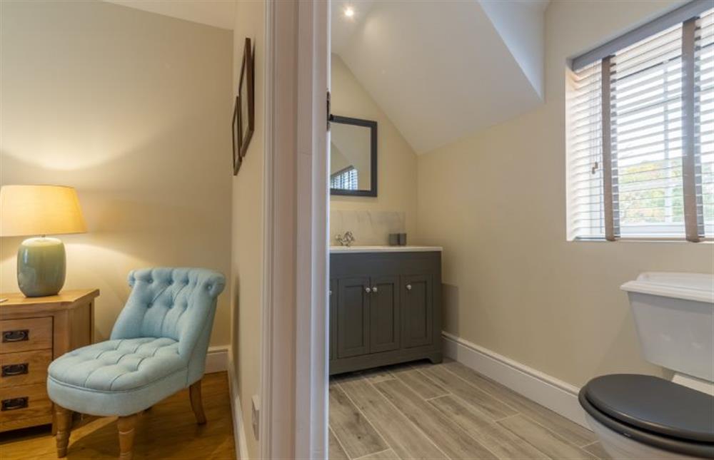 First floor: Master bedroom en-suite with shower cubicle, WC and hand basin at 1 Hall Lane Cottages, Thornham  near Hunstanton