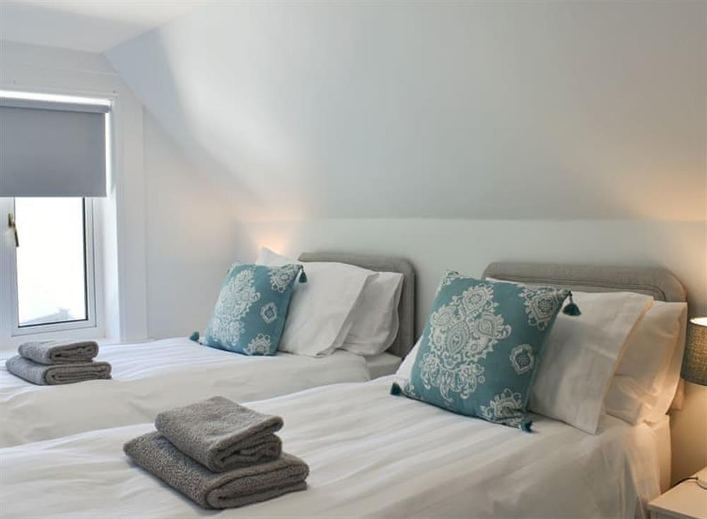 Comfy twin bedroom at 1 Hamilton Terrace in Lamlash, Isle of Arran, Scotland