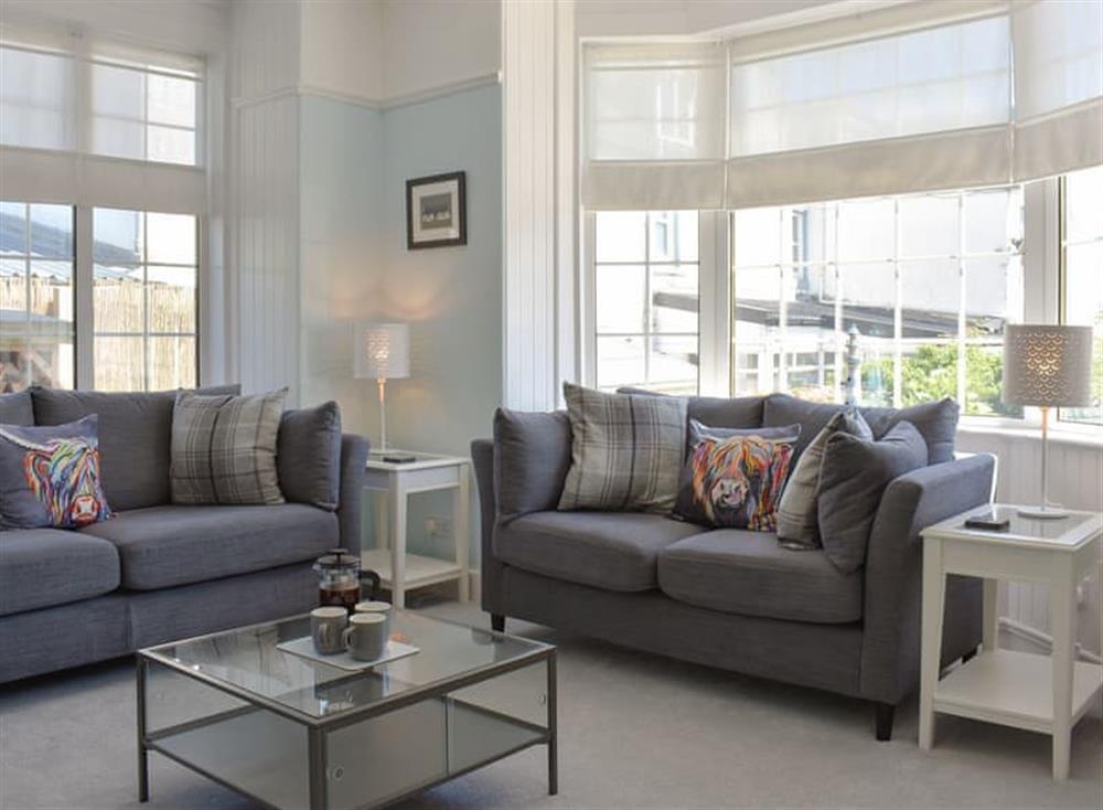 Light and airy living room at 1 Hamilton Terrace in Lamlash, Isle of Arran, Scotland