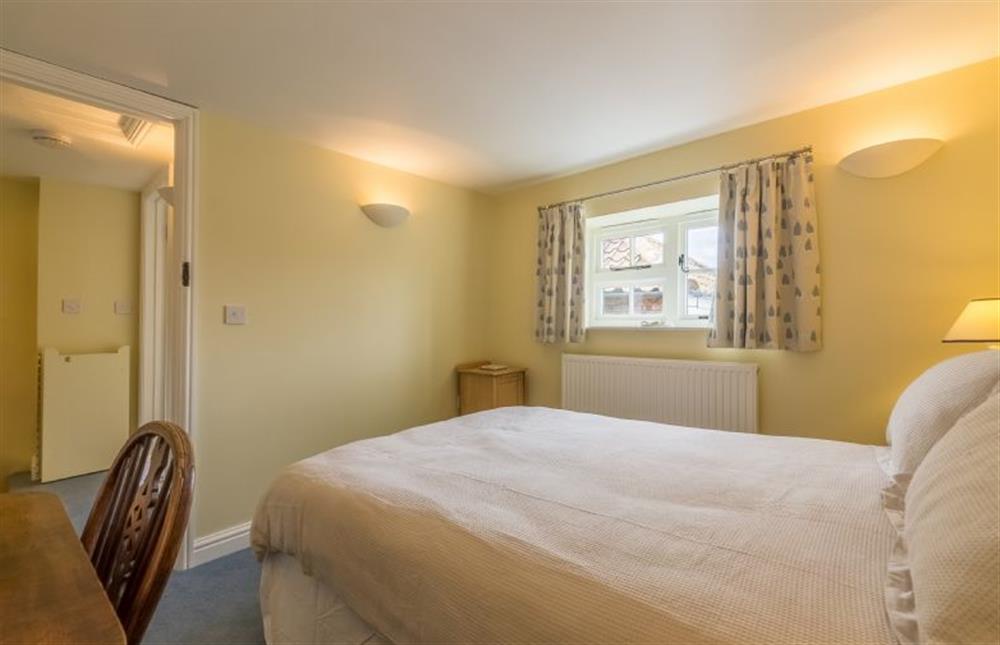First floor: Bedroom two with double bed at 1 Honeymoon Row, Wells-next-the-Sea