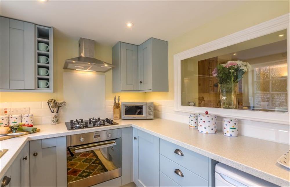 Ground floor: Kitchen with electric oven and gas hob at 1 Honeymoon Row, Wells-next-the-Sea