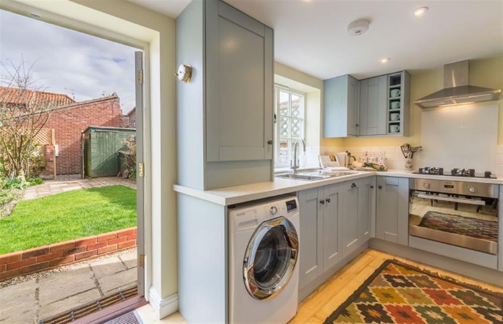 Ground floor: Kitchen with french doors leading into the garden at 1 Honeymoon Row, Wells-next-the-Sea