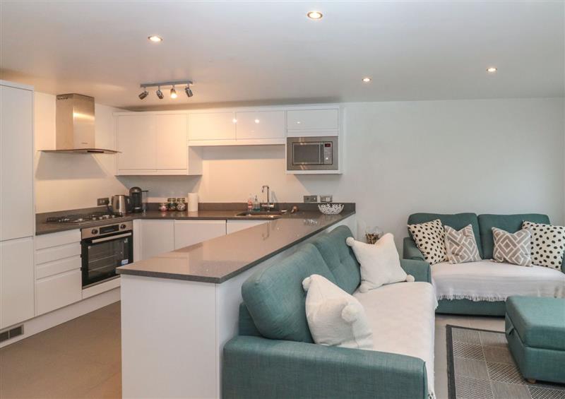 Relax in the living area at 1 Kents Mews, Torquay