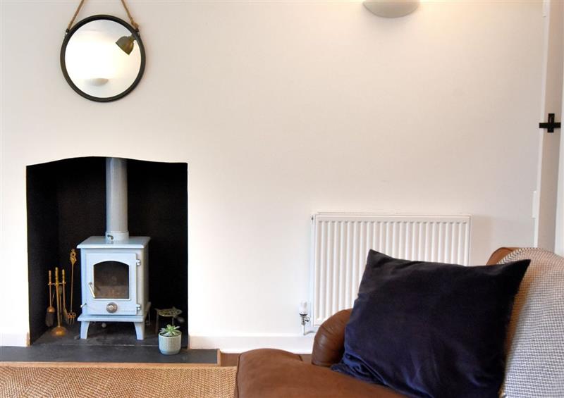 Relax in the living area (photo 2) at 1 Lymbrook Cottages, Lyme Regis