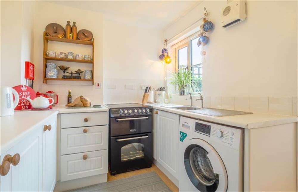 Kitchen with washing machine and oven at 1 Market Hill, Orford