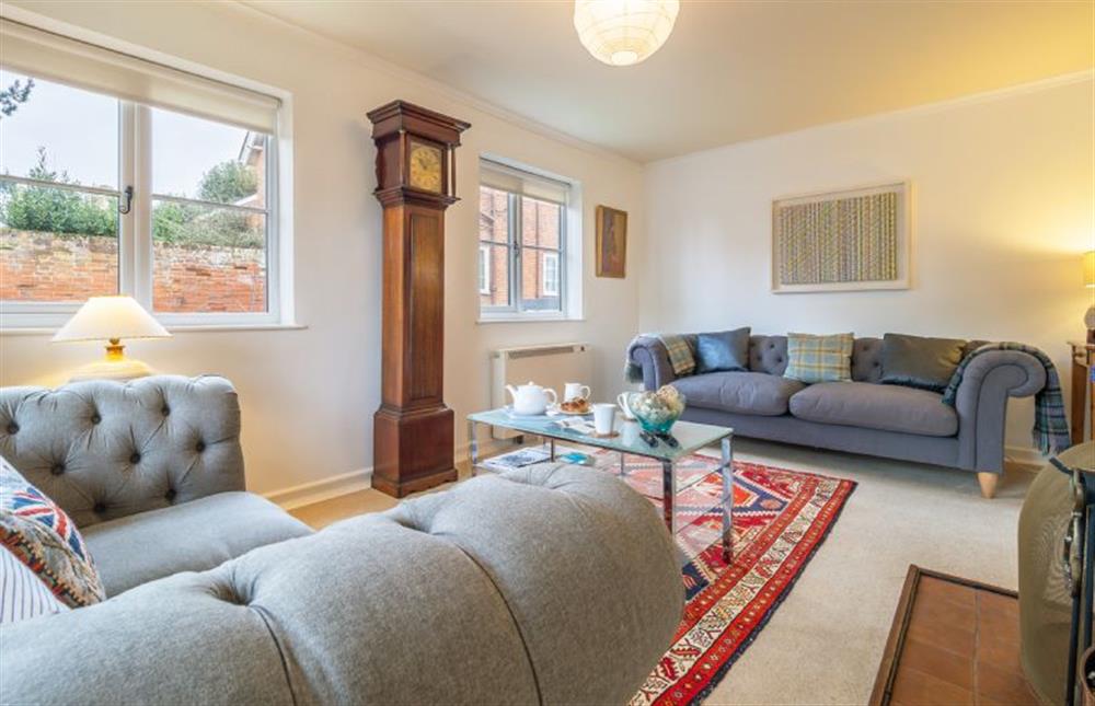 Sitting room with comfy seating and views towards the castle at 1 Market Hill, Orford