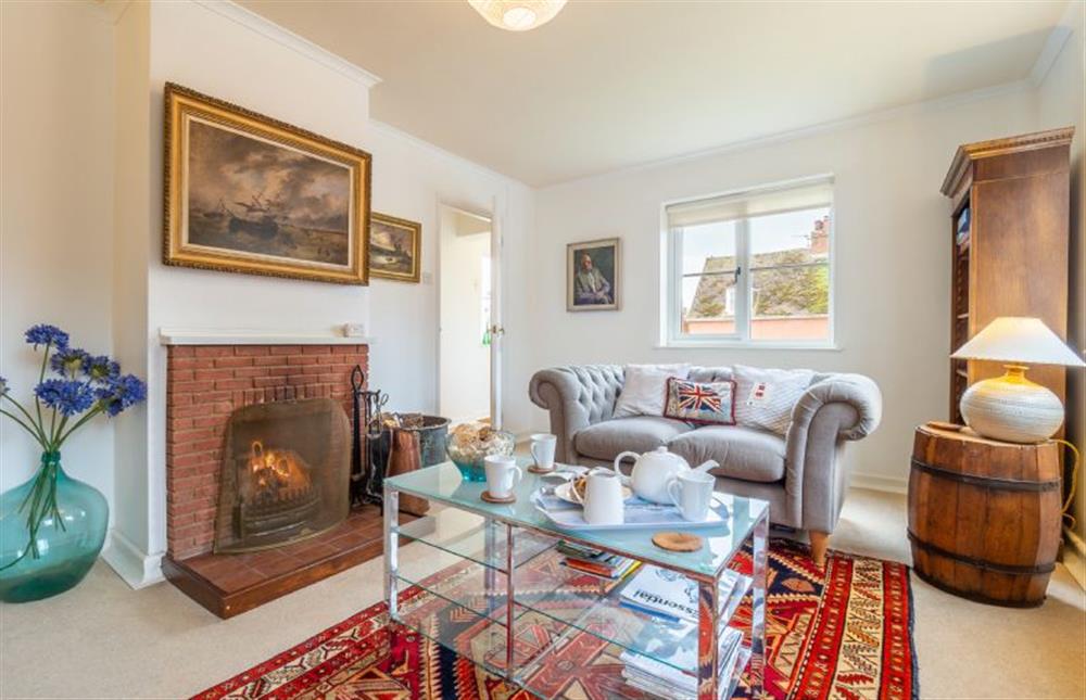 Sitting room with open fire at 1 Market Hill, Orford