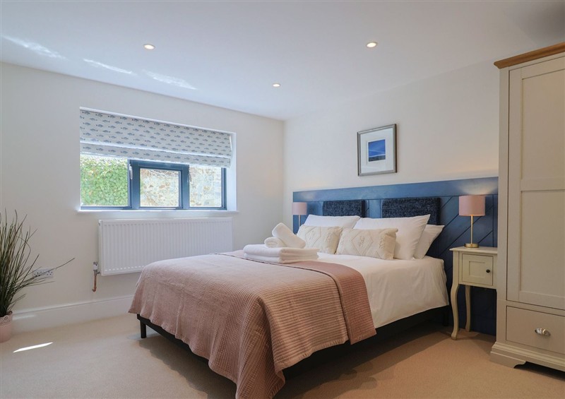 A bedroom in 1 Mill Green Court at 1 Mill Green Court, Lyme Regis