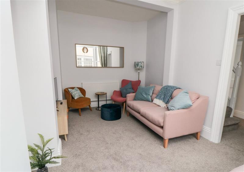 Relax in the living area at 1 Princess Street, Scarborough
