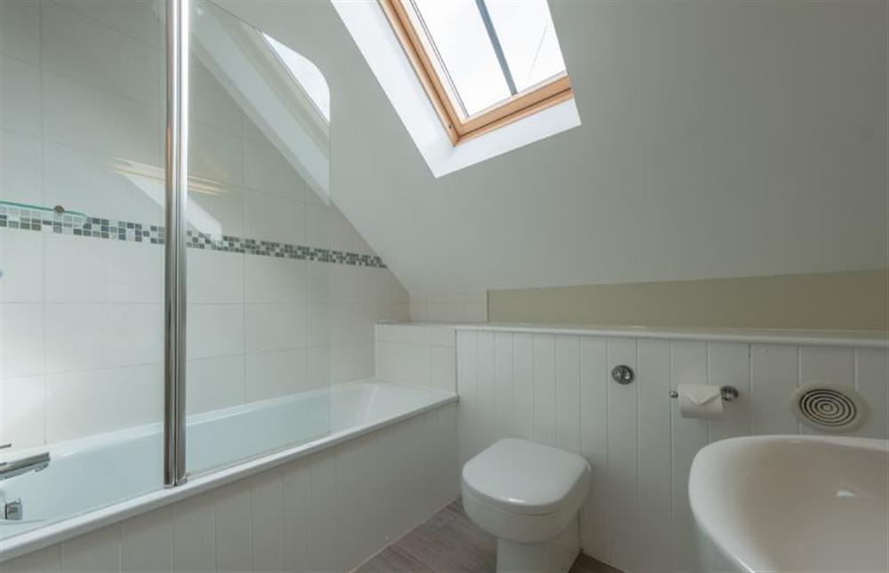 First floor: Bathroom with bath and shower over, wash basin and WC at 1 Railway Cottages, Holt