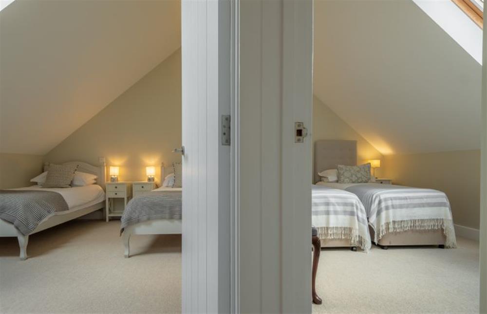First floor: Bedroom two (left) and bedroom three (right) at 1 Railway Cottages, Holt