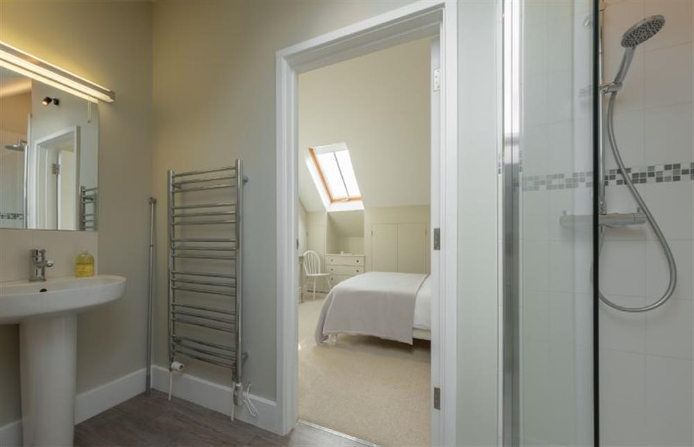 First floor: En-suite with large walk-in shower, wash basin and WC at 1 Railway Cottages, Holt