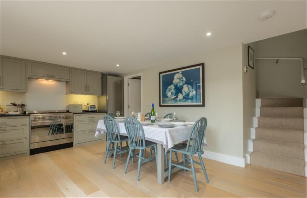 Ground floor: Dining area and stairs to the first floor at 1 Railway Cottages, Holt