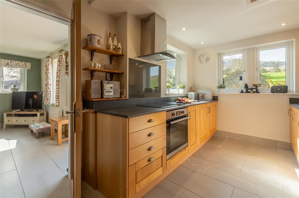 Kitchen with views of the fells at 1 Riverside Cottage, Burnsall