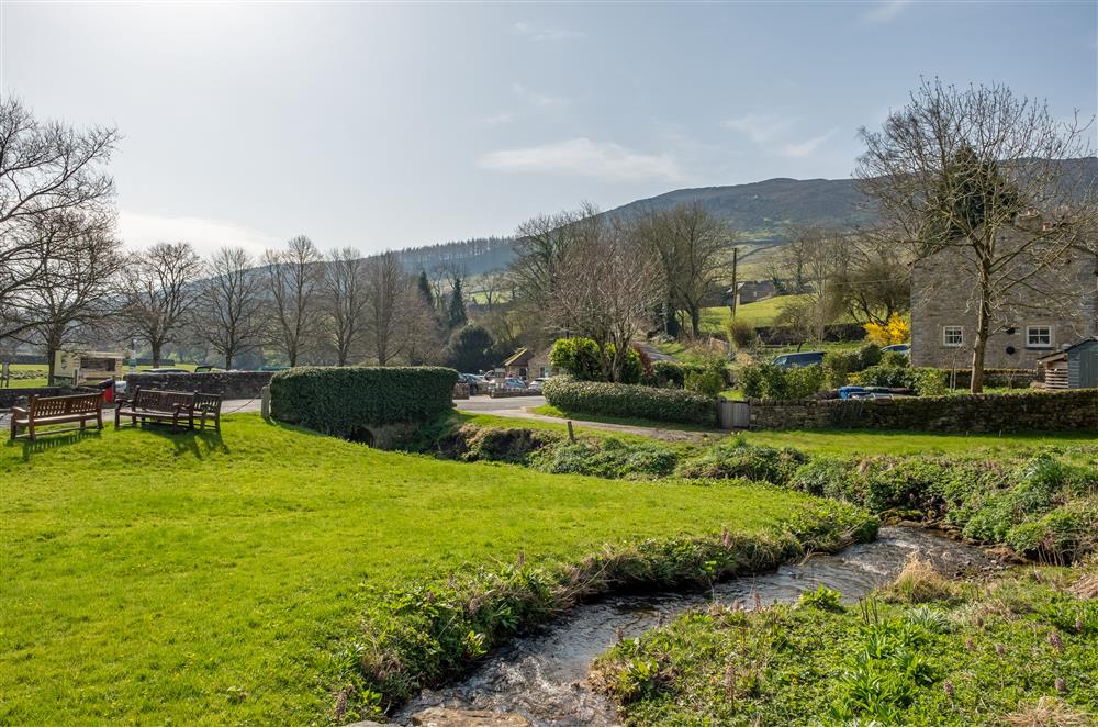 Stream and view of the hills at 1 Riverside Cottage, Burnsall