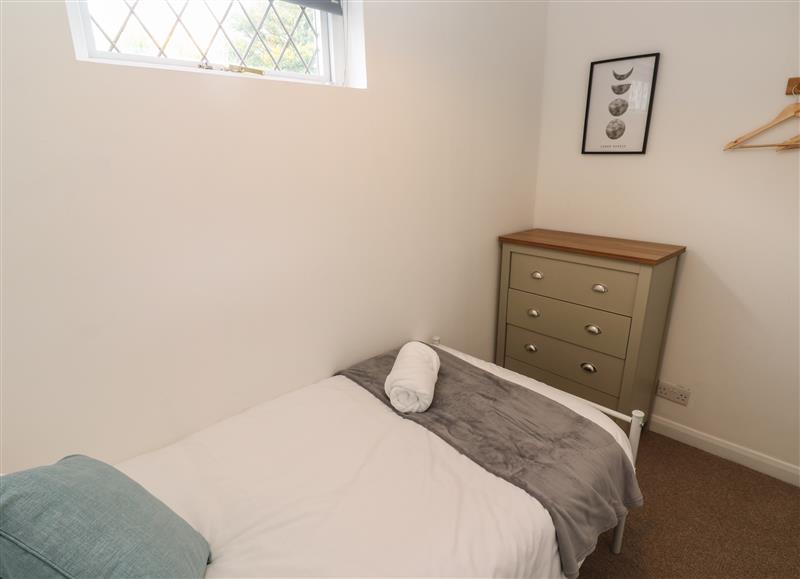 A bedroom in 1 Riverside Cottage at 1 Riverside Cottage, Cusgarne near Perranarworthal
