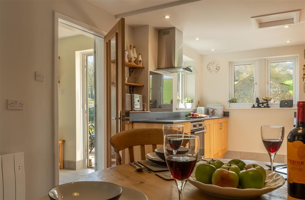 Dining area with far reaching views at 1 Riverside Cottages, Skipton, North Yorkshire