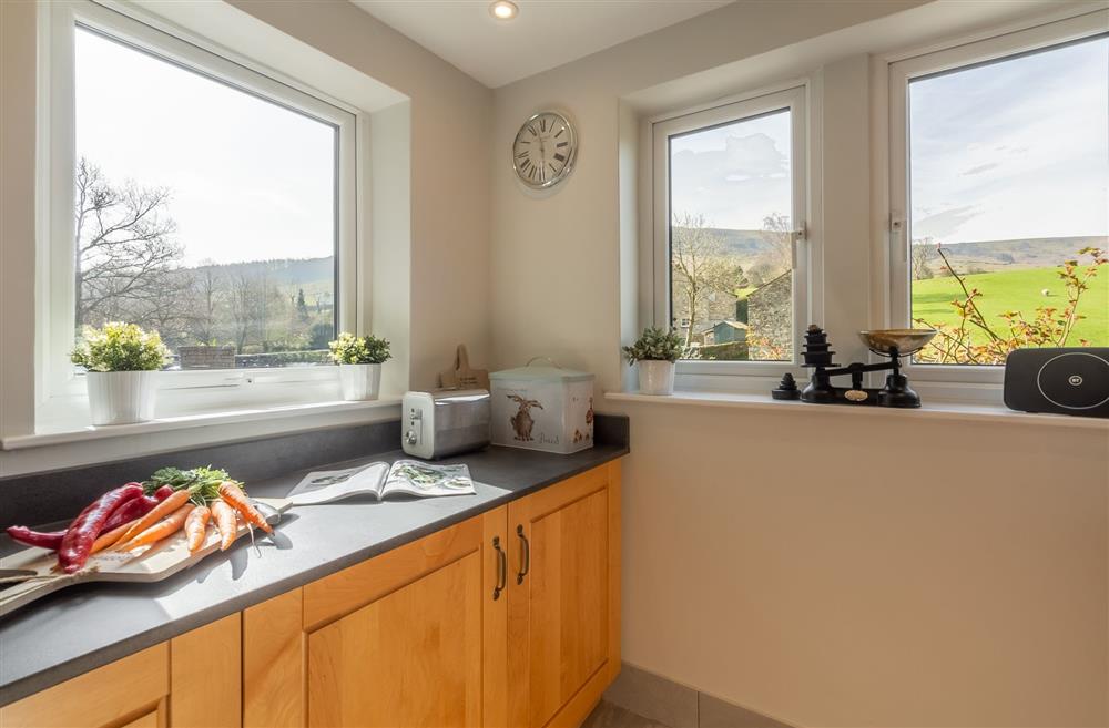 Kitchen with lovely large windows at 1 Riverside Cottages, Skipton, North Yorkshire