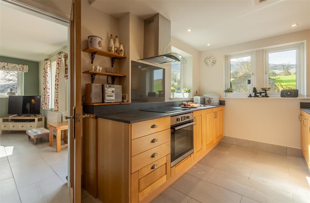 Kitchen with views of the hills at 1 Riverside Cottages, Skipton, North Yorkshire