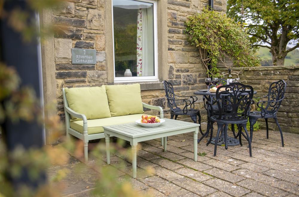 Outside seating area at 1 Riverside Cottages, Skipton, North Yorkshire