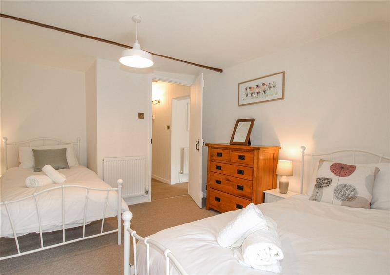 This is a bedroom (photo 2) at 1 Rose Cottage, Shipton Gorge