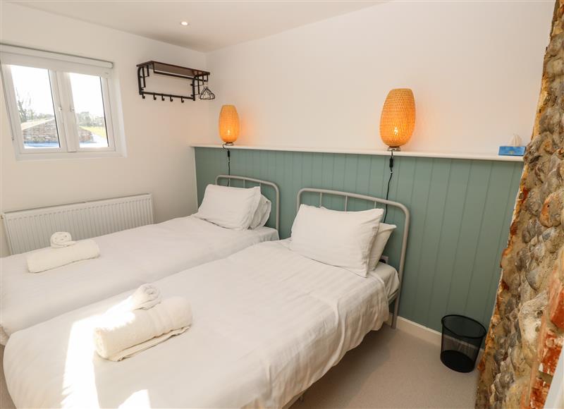 This is a bedroom at 1 Star Cottages, Freshwater