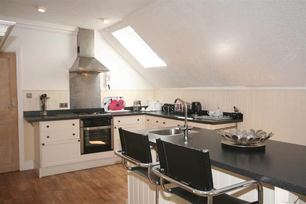Contemporary kitchen on the first floor at 1 The Old Coach House in Warfleet Creek, Dartmouth